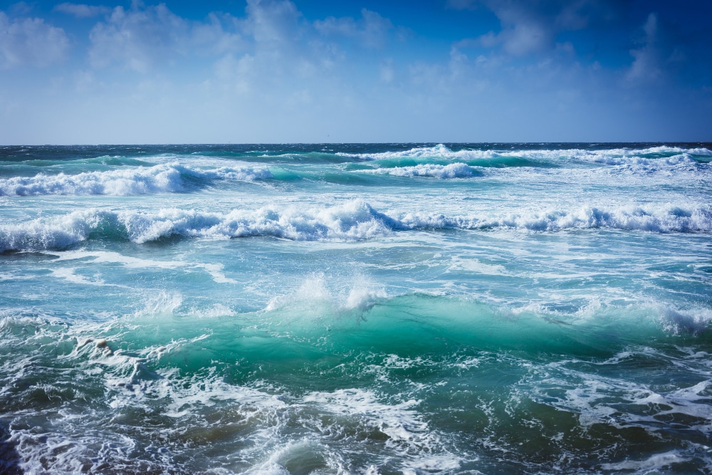 Sounds of gentle ocean waves breaking